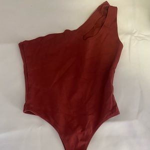 single strap body suit